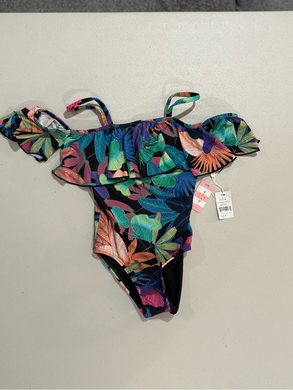 Pilyq Black One-Piece with Bright Tropical Leaf Print